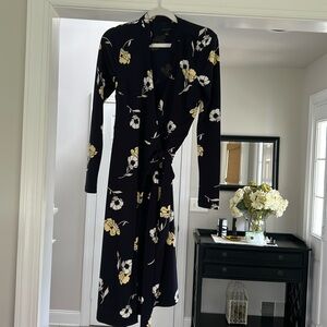Ann Taylor Dress. Size 2. Colors: Navy with pale yellow and white floral